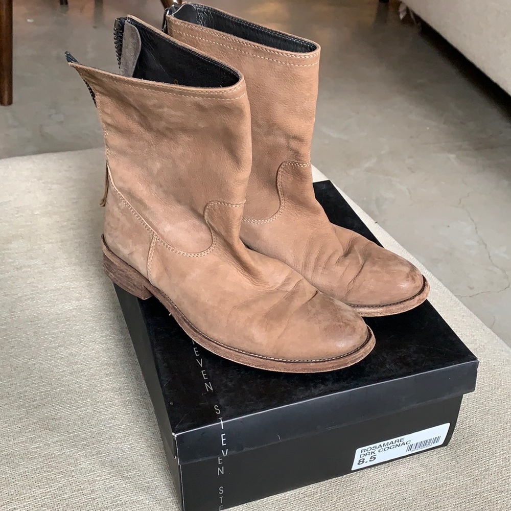 Tan colored Steven boots with zipper in back